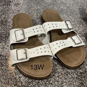 EUC white Torrid Sandal with metal detail.